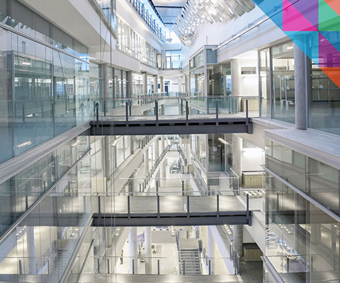 University of Alberta: interior shot of modern glass building.