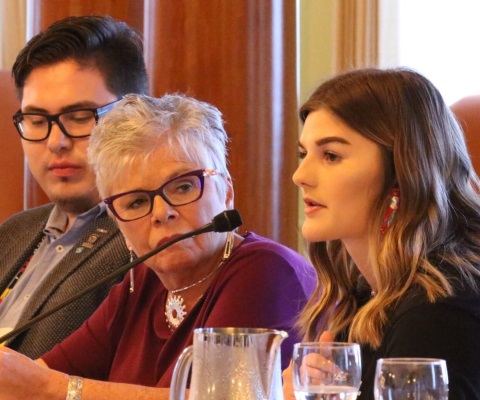 Roberta Jamieson, CEO of Indspire, with students at a panel.