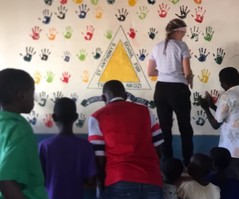 Emily LeRoux teaching at a school for deaf children in Uganda